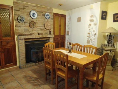 Ca Tudela Tur, comedor con chimenea